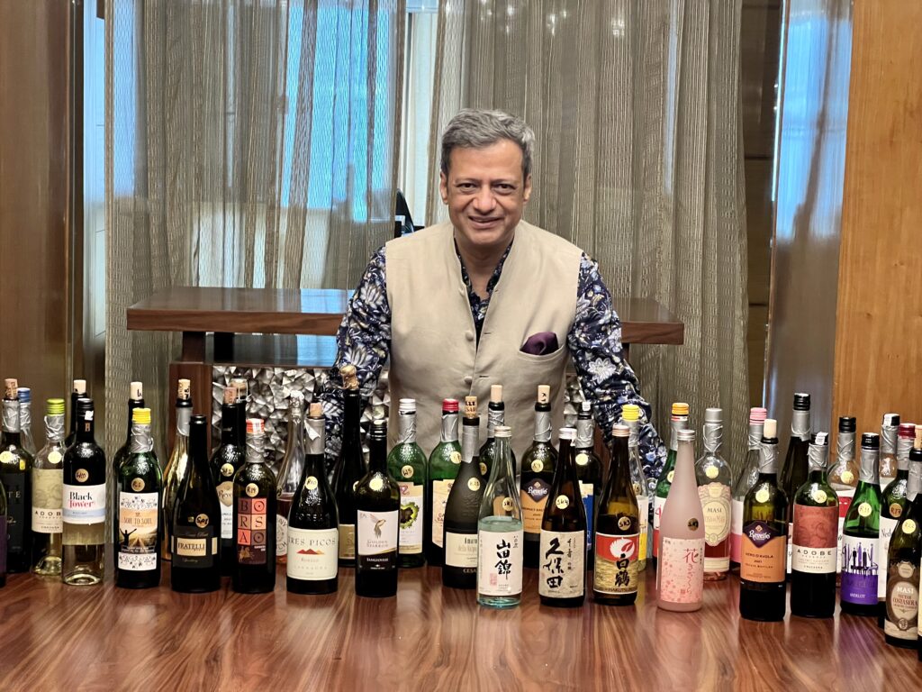 Ravi Joshi with the Blind Tasting lineup of Wines and Sake for Spiritz Magazine