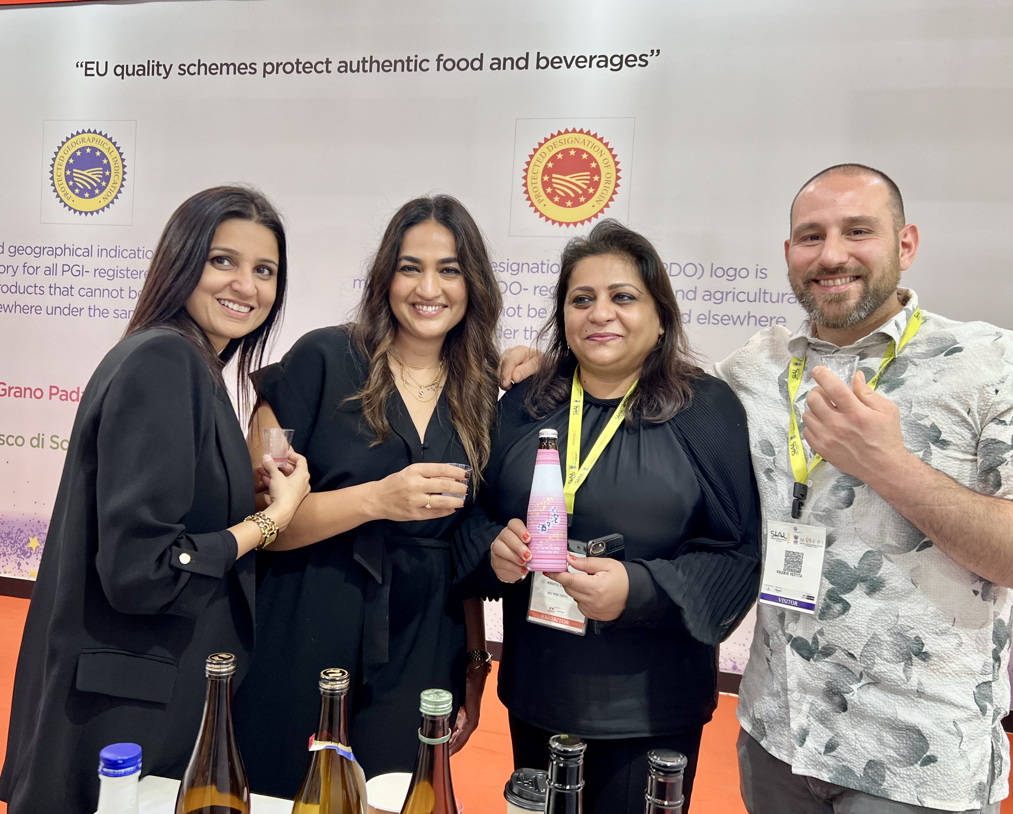 Ravi Joshi with visitors at the Sake Club India booth at Vinexpo Delhi 2022