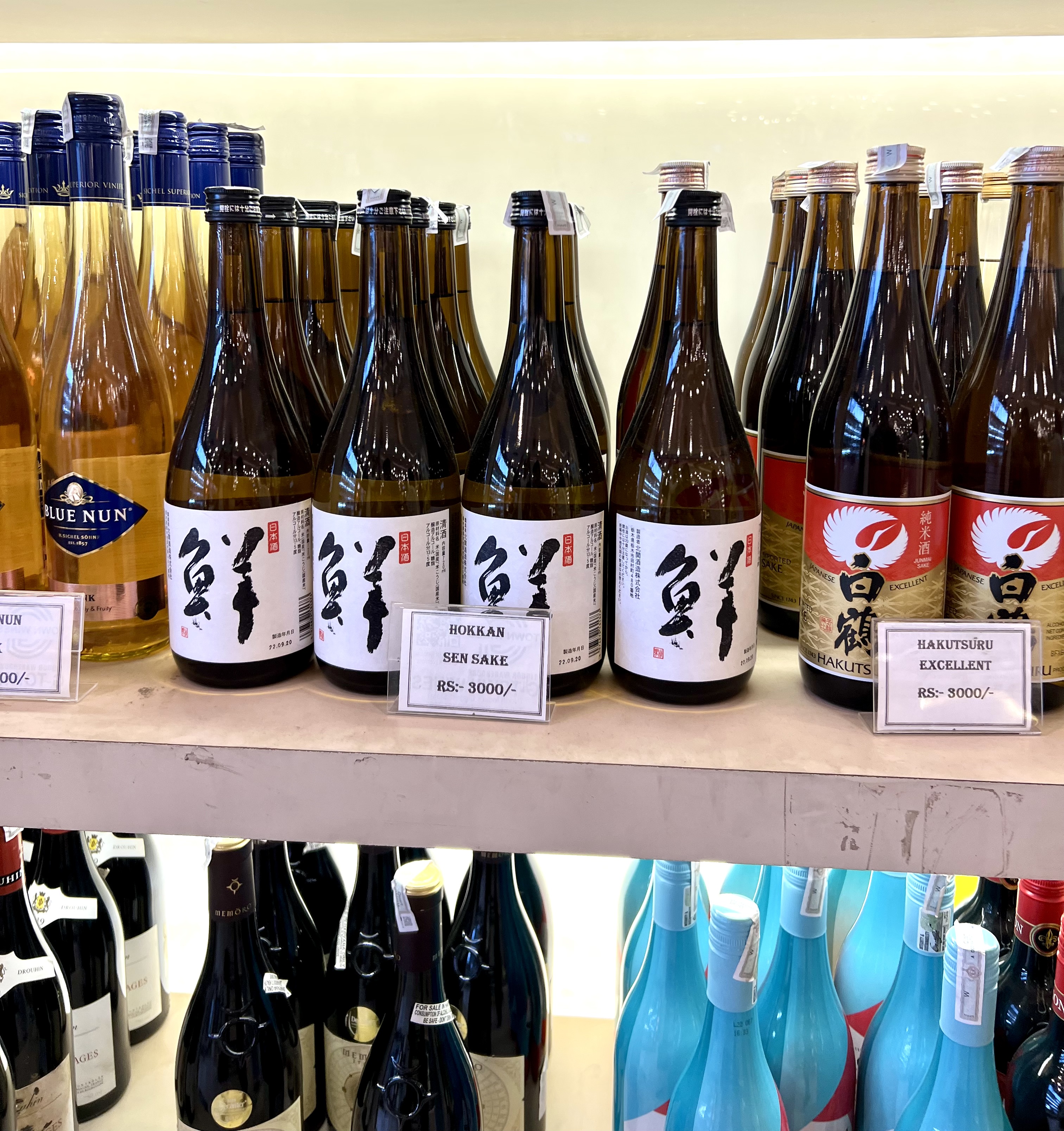 Sake bottles on retail shelves in Gurugram India