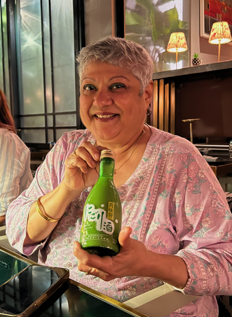 India's first woman bartender Shatbhi Basu with Gekkeikan Nigori Sake at a Sake Club India event.