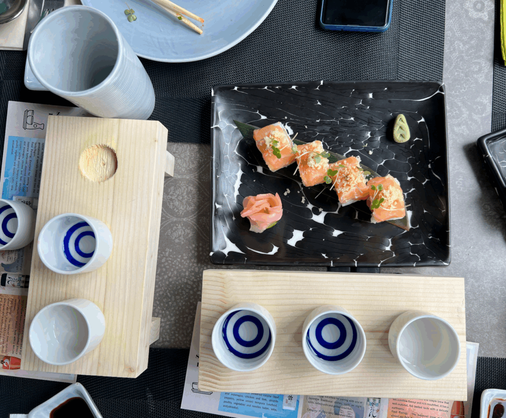 Sake tasting flights with food.