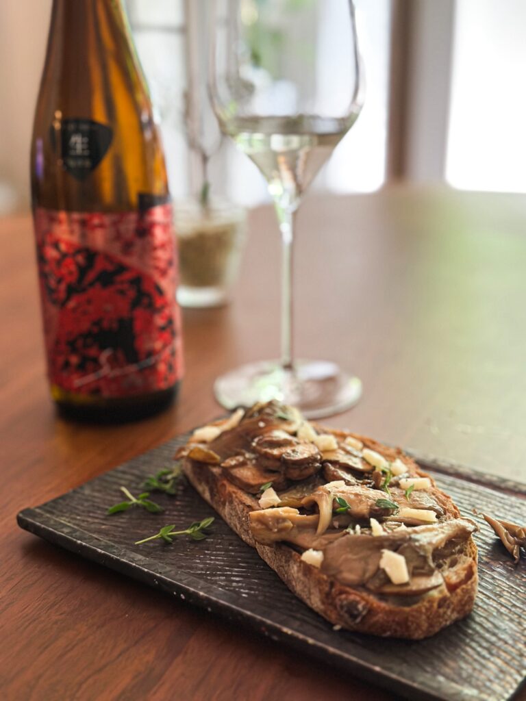 Sabineko rock amasake yamahai junmai ginjo sake paired with an umami rich mushroom toast