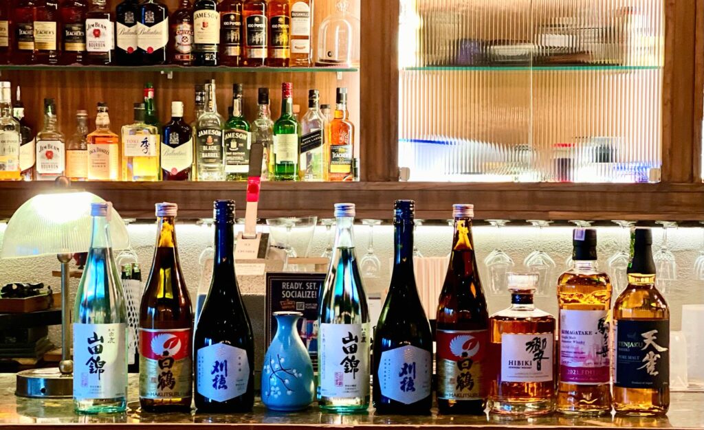 A line up including Japanese whisky at a Sake Club India event