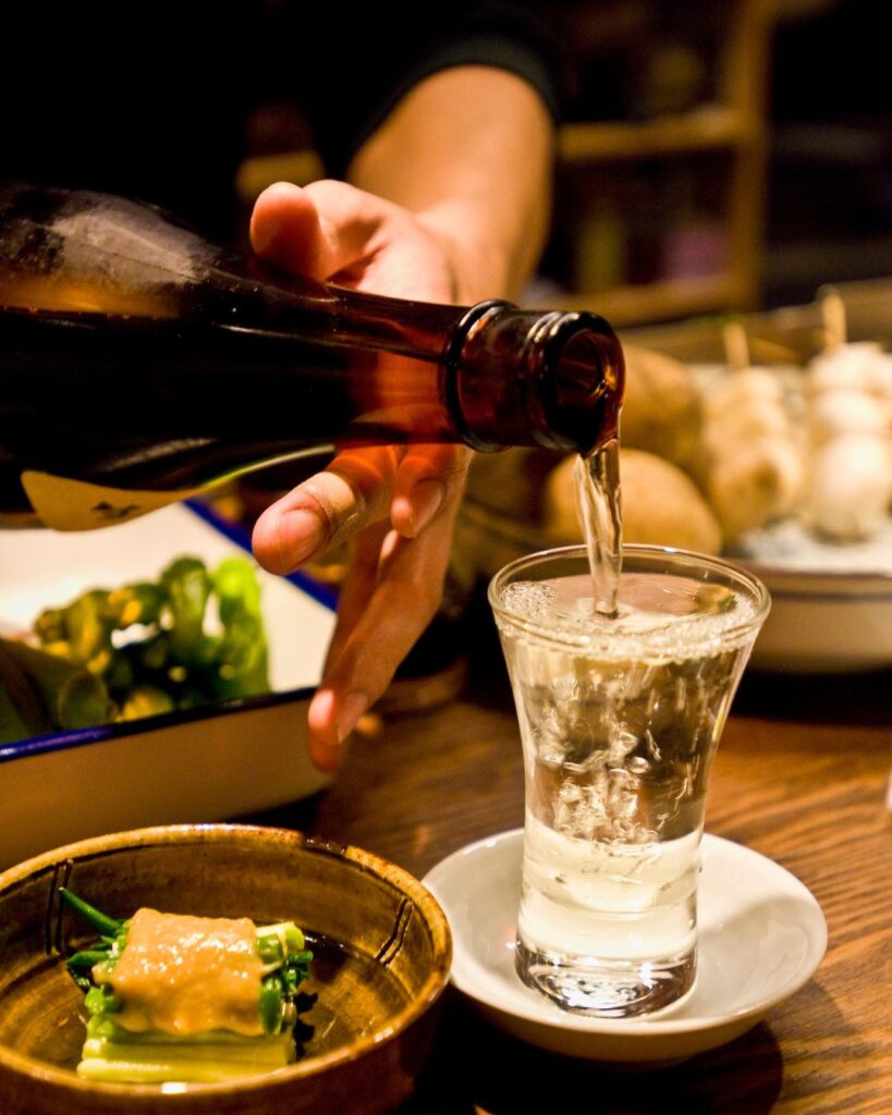 Sake being poured from a bottle